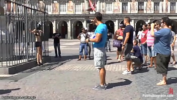Tourists shooting masked and bound bare boobs slave Carol Vega in the streets of Madrid then her master and bf Omar Galanti fucks her in the park